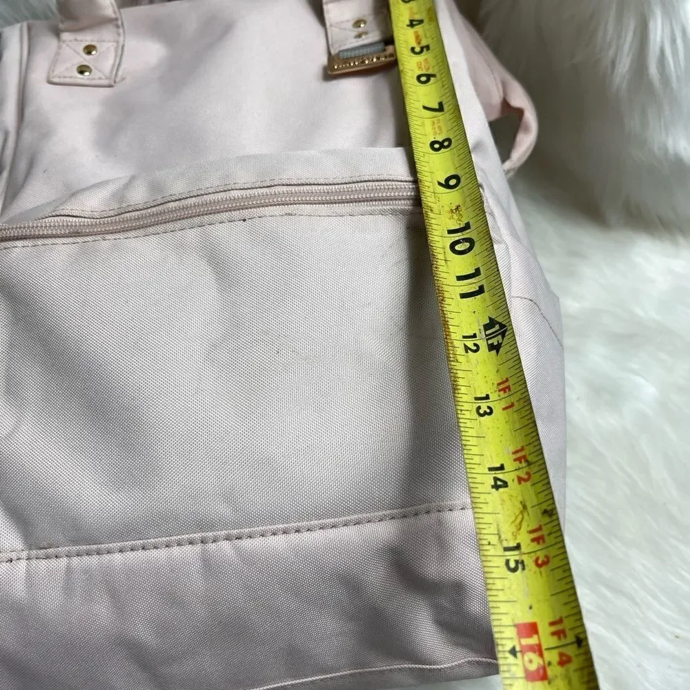 Swiss Gear light pink canvas multi purpose backpack with Rose gold Hardw…